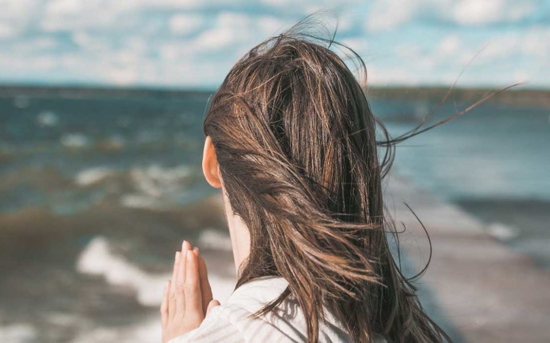 woman staring at the ocean