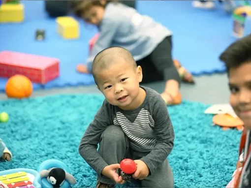 a child playing with blocks